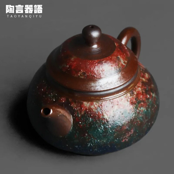Rock mineral sand pottery Dunhuang ancient rhyme gradient round teapot handmade retro pottery hand-held tea single teapot