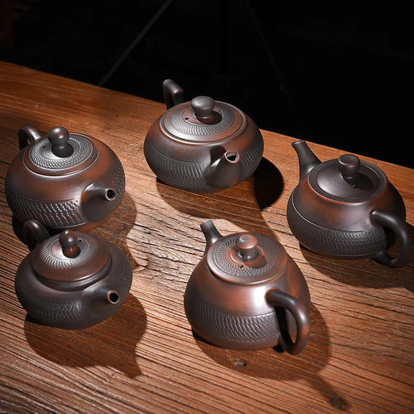 Jump knife Purple Pottery Teapot Ceramic Household Pot Kung Fu Tea Set Pure Handmade Teapot Teapot for Tea Puer Tea Kettle Jump knife Purple Pottery Teapot Ceramic Household Pot Kung Fu Tea Set Pure Handmade Teapot Teapot for Tea Puer Tea Kettle