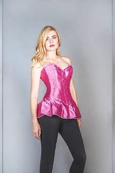 Front view of the vibrant silk corseted skirt with basque style.