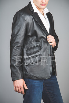 Side profile of the SERJEY blazer showing the narrower, nipped waist silhouette