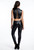 Back view of natural leather skinny leggings showing smooth finish and body-contouring design