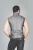 Back view of military-style steampunk vest showing tailored fit and classic cut