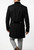 Back view of black pirate-style military coat showing long tails and fitted waistline