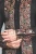 Close-up of the detailed fabric and button closure on the Steampunk jacket