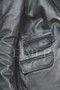 Detail of the four-pocket design on the versatile leather jacket