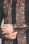 Close-up of the detailed fabric and button closure on the Steampunk jacket