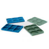 FlexiGerm seed starter tray components laid out in blue and green, showing bases and removable inserts for multi-seed germination