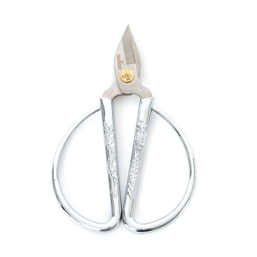 Gambit Growing precision bypass pruners with stainless steel blades and polished ergonomic handles on a white background