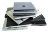 Refurbished Used laptop pile: Multiple models, no specific brand or feature highlighted.