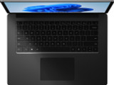 Refurbished A view of a laptop keyboard and trackpad from an angle that does not show the screen or any part of the laptops body,