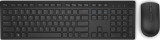 Refurbished A black Dell keyboard and mouse on a gray surface, with one of them slightly tilted.