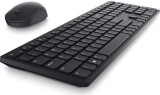 Refurbished Black refurbished Dell wireless keyboard and mouse set on white surface, angled to show dongle slot and ergonomic design.