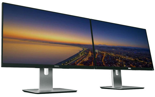 Refurbished Dell P2414H monitors, one placed sideways and the other facing forward, displaying vibrant sunset over waterfront city