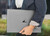 Refurbished The image displays a person holding an HP ZBook Fury 15 G7 Workstation laptop, which features a grey color scheme with a...