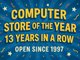 Refurbished A digital sign advertising a 13-year-old computer stores anniversary sale, featuring an Intel Quad Core i3-10100T 3.0 GHz