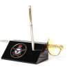 Air Force Sword Desk Set Air Force Medallion in a stylish acrylic desk stand with a quality pen and Air Force sword letter opener.  Presented in a silver gift box with a clear lid, this is the perfect gift to put on the desk