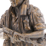  Vietnam Digger Figurine The uniform and equipment worn by this infantryman is representative of Australian servicemen during the conflict in Vietnam. The floppy design of his bush hat, or 'giggle hat', was intended to break