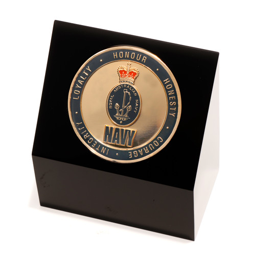 Navy Medallion In Block Superb Navy 48mm medallion presented in a black acrylic desk block. Order now, the block is presented in a form cut gift box making it perfect for awards, presentations or that special gift. Specifica