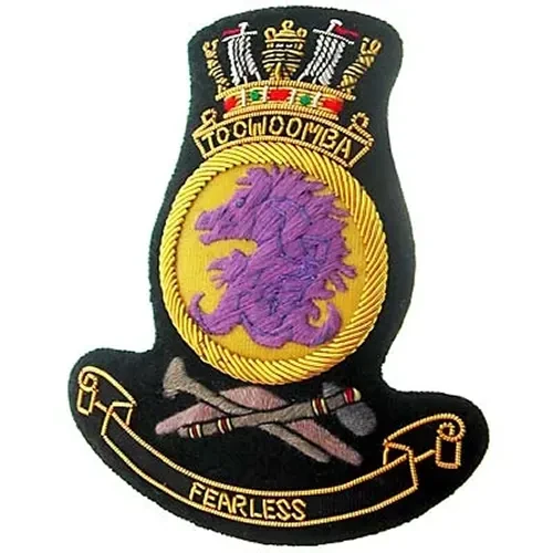 HMAS Toowoomba Bullion badge Superb HMAS Toowoomba Bullion Pocket Badge perfect for your Blazer, bag or where you want a stylish badge, order now from the military specialists. Approximate size 80x80mm. Securely fastens with 3 bu