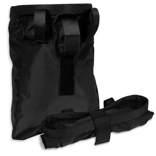 Tasmanian Tiger Dump Pouch BK Tasmanian Tiger Dump Pouch BK order now from the military specialists. 'Dumping pouch' for magazines or other utensils. Features: One-handed operation with folding side parts * Small roll-together, fa