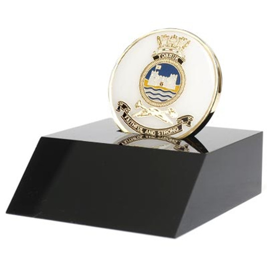 HMAS Tobruk Medallion In Stand Superb HMAS Tobruk 48mm medallion presented in a black acrylic stand. Order now, the block is presented in a form cut gift box making it perfect for awards, presentations or that special gift. Specifi