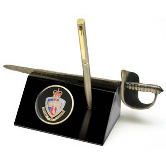 ADFA Sword Desk Set Australian Defence Force Academy (ADFA) Medallion in a stylish acrylic desk stand with a quality pen and Army sword letter opener. Presented in a silver gift box with a clear lid, this is the perfect ADFA Sword Desk Set Australian Defence Force Academy (ADFA) Medallion in a stylish acrylic desk stand with a quality pen and Army sword letter opener. Presented in a silver gift box with a clear lid, this is the perfect