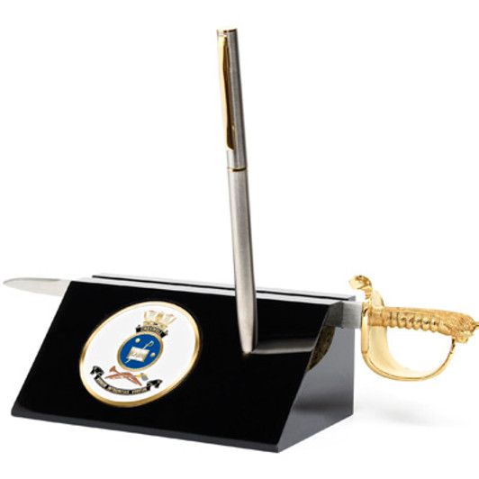 HMAS Creswell Sword Desk Set HMAS Creswell Medallion in a stylish acrylic desk stand with a quality pen and Navy sword letter opener.  Presented in a silver gift box with a clear lid, this is the perfect gift to put on the desk a