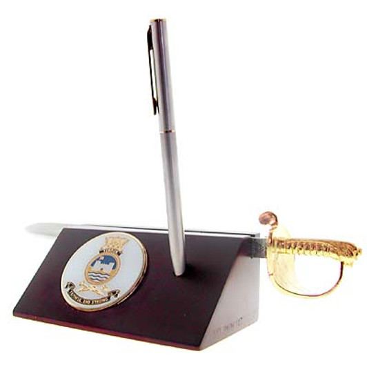 HMAS Tobruk Sword Desk Set HMAS Tobruk Medallion in a stylish acrylic desk stand with a quality pen and Navy sword letter opener.  Presented in a silver gift box with a clear lid, this is the perfect gift to put on the desk at