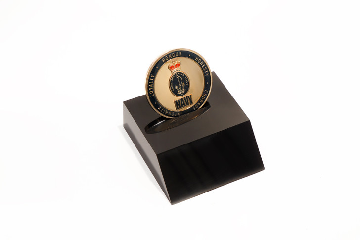 Navy Medallion In Stand Navy Medallion In Stand Superb Navy 48mm medallion presented in a black acrylic desk stand. Order now, the block is presented in a form cut gift box making it perfect for awards, presentations or that special gift. Specifica
