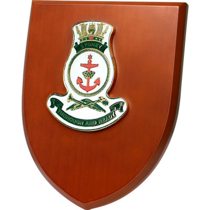 HMAS Sydney Shield Plaque An Exceptional HMAS Sydney Plaque order now. This beautiful plaque features a 100mm full colour enamel crest set on a 200x160mm timber finish shield. Presented in a stylish silver gift box with form c