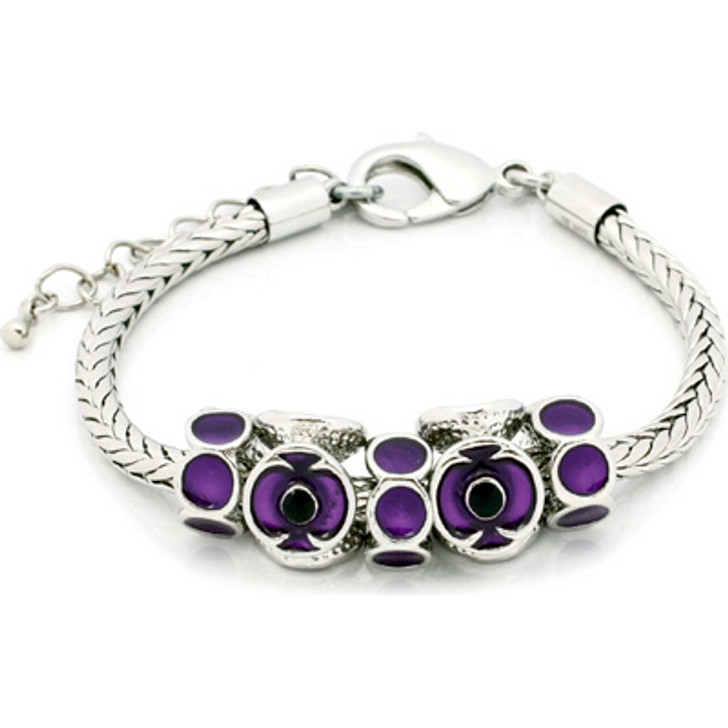 Purple Poppy Charms Bracelet Purple Poppy Charms Bracelet The vivid purple poppies in this beautiful silver plate Purple Poppy Charm Bracelet recognise the service and sacrifice of all animals in war. The purple poppy uniquely recognises these un-sung heroes