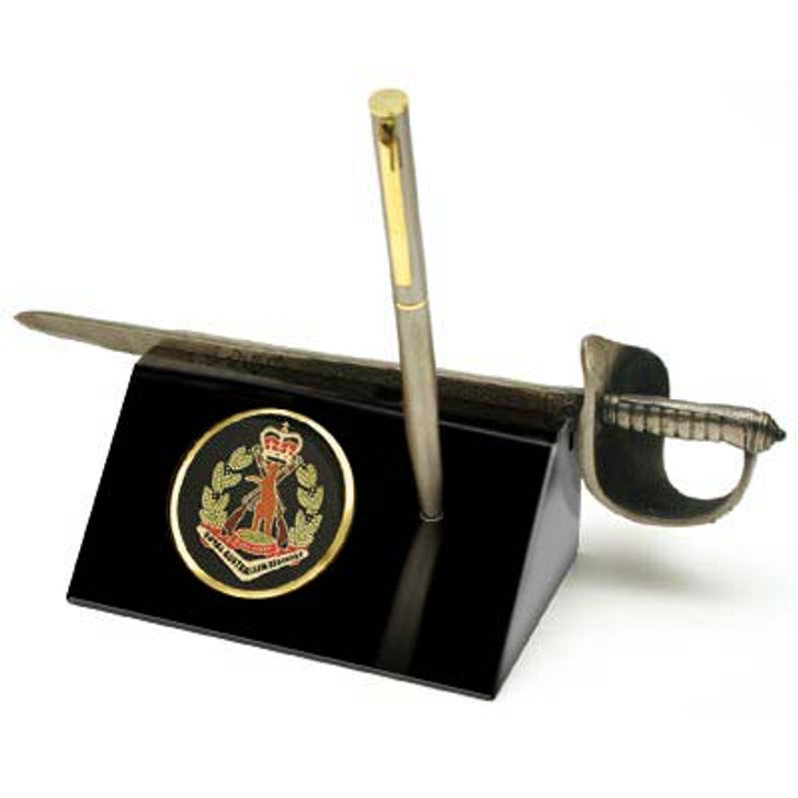 RAR Sword Desk Set Royal Australian Regiment (RAR) Medallion in a stylish acrylic desk stand with a quality pen and Army sword letter opener. Buy now from the military specialists. Presented in a silver gift box with a