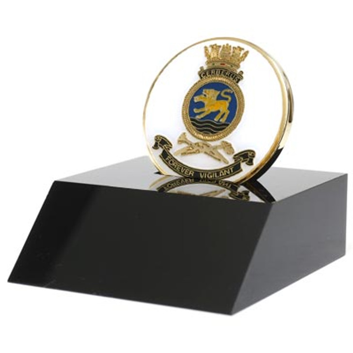 HMAS Cerberus Medallion In Stand HMAS Cerberus Medallion In Stand Superb HMAS Cerberus 48mm medallion presented in a black acrylic stand. Order now, the block is presented in a form cut gift box making it perfect for awards, presentations or that special gift. Speci
