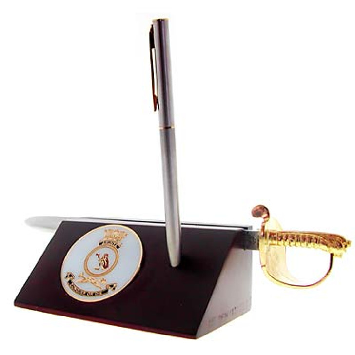 HMAS Arunta Sword Desk Set HMAS Arunta Medallion in a stylish acrylic desk stand with a quality pen and Navy sword letter opener.  Presented in a silver gift box with a clear lid, this is the perfect gift to put on the desk at