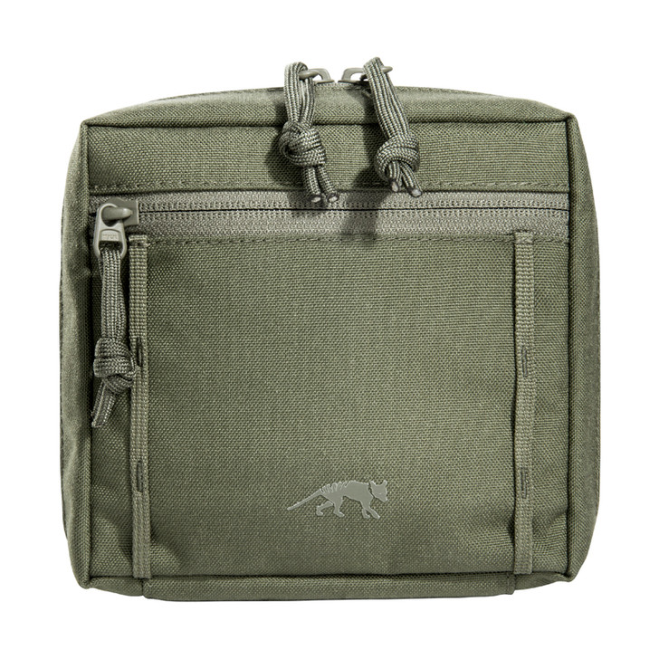 TT Tac Pouch 5.1 (olive) Tasmanian Tiger TAC Pouch 5.1-Olive Accessory pouch with a large opening and the MOLLE reverse system. The inside features MOLLE hook-and-loop, a mesh pocket and elastic loops. FEATURES: New smart design Extra wide zipped opening Flat m