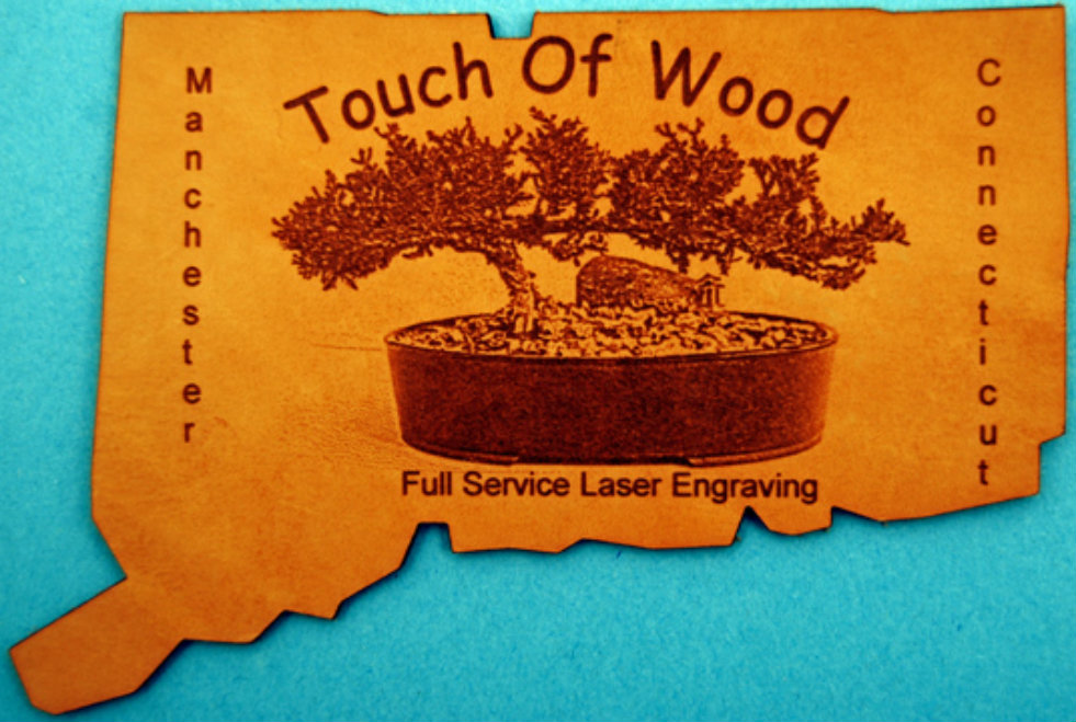  The Leather is engraved using both text and a photograph image and then cut to the shape of Connecticut. 