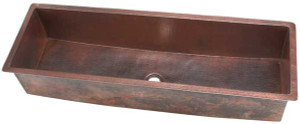 Full bottomed hammered copper trough sink. Full bottomed hammered copper trough sink.