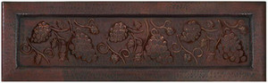 Grape cluster vine on apron front copper sink Grape cluster vine on apron front copper sink