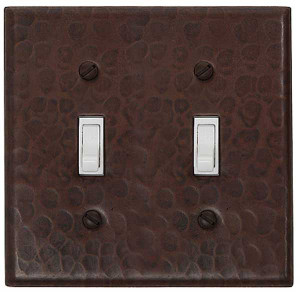 Double toggle switchplate cover in hammered copper Double toggle switchplate cover in hammered copper