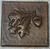 Hammered copper tile with acorn and leaves design Hammered copper tile with acorn and leaves design