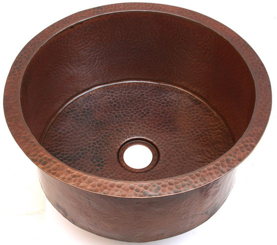 Hammered copper drum sink in dark copper