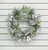 60cm Flock Mixed Pine/Cone Wreath