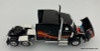 DCP by FG 1:64 Peterbilt 579 Mid Roof Sleeper Cab w/Utility Roll Tarp Spread Axle Trailer, Black/Custom Paint