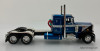 DCP by FG 1:64 Peterbilt 359 Sleeper w/Wilson Roadbrute 53' Flatbed Spread-Axle Trailer, Metallic Blue 