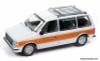 1985 Dodge Caravan, White w/Woodgrain 1:64 Diecast Model Car by Auto World