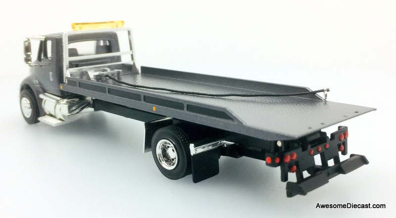 Gray SpecCast 1 - 64 International 8600 Roll Back Flatbed Car