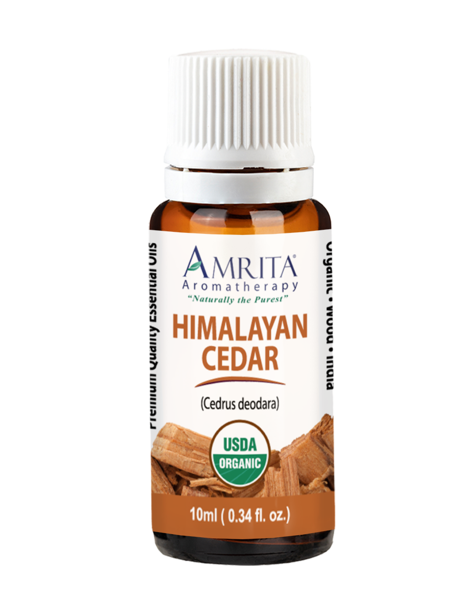 . AMRITA Aromatherapy Naturally the Purest HIMALAYAN CEDAR Cedrus deodara riennum guaiy cysenual vis DIDUI NOOAR MIDRIA TR S A 