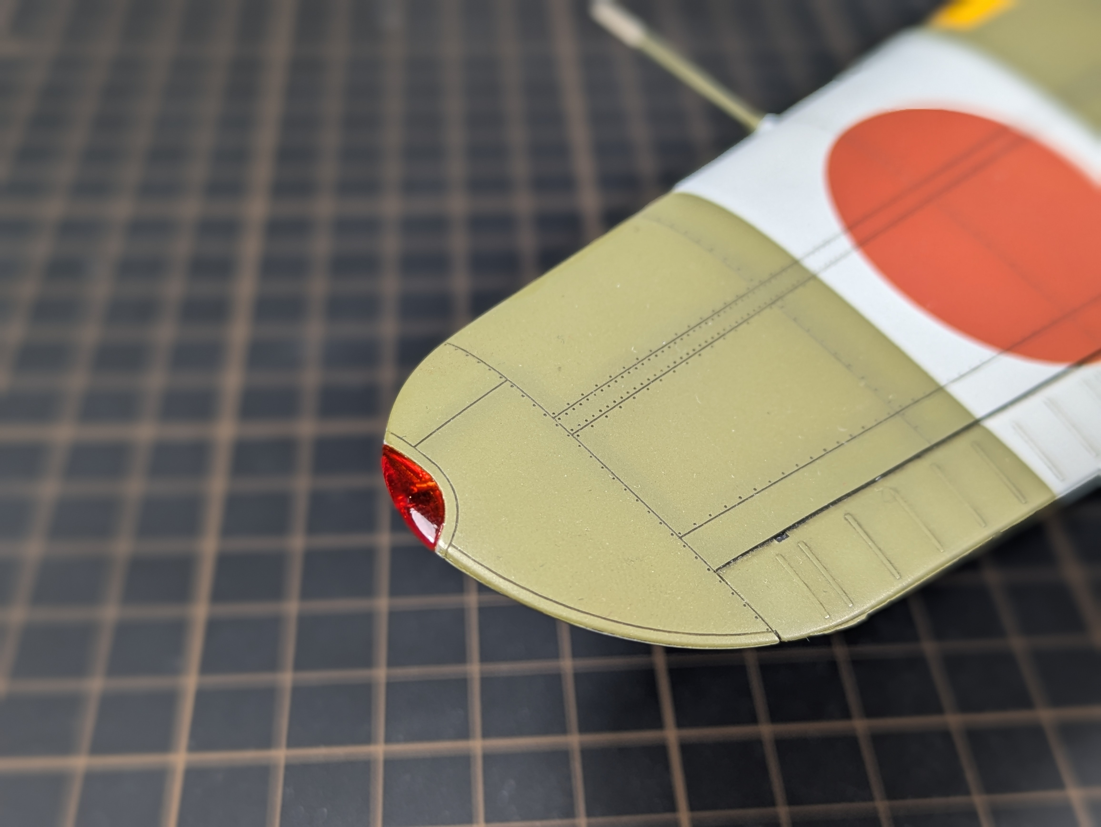 Topside red wing tip light
