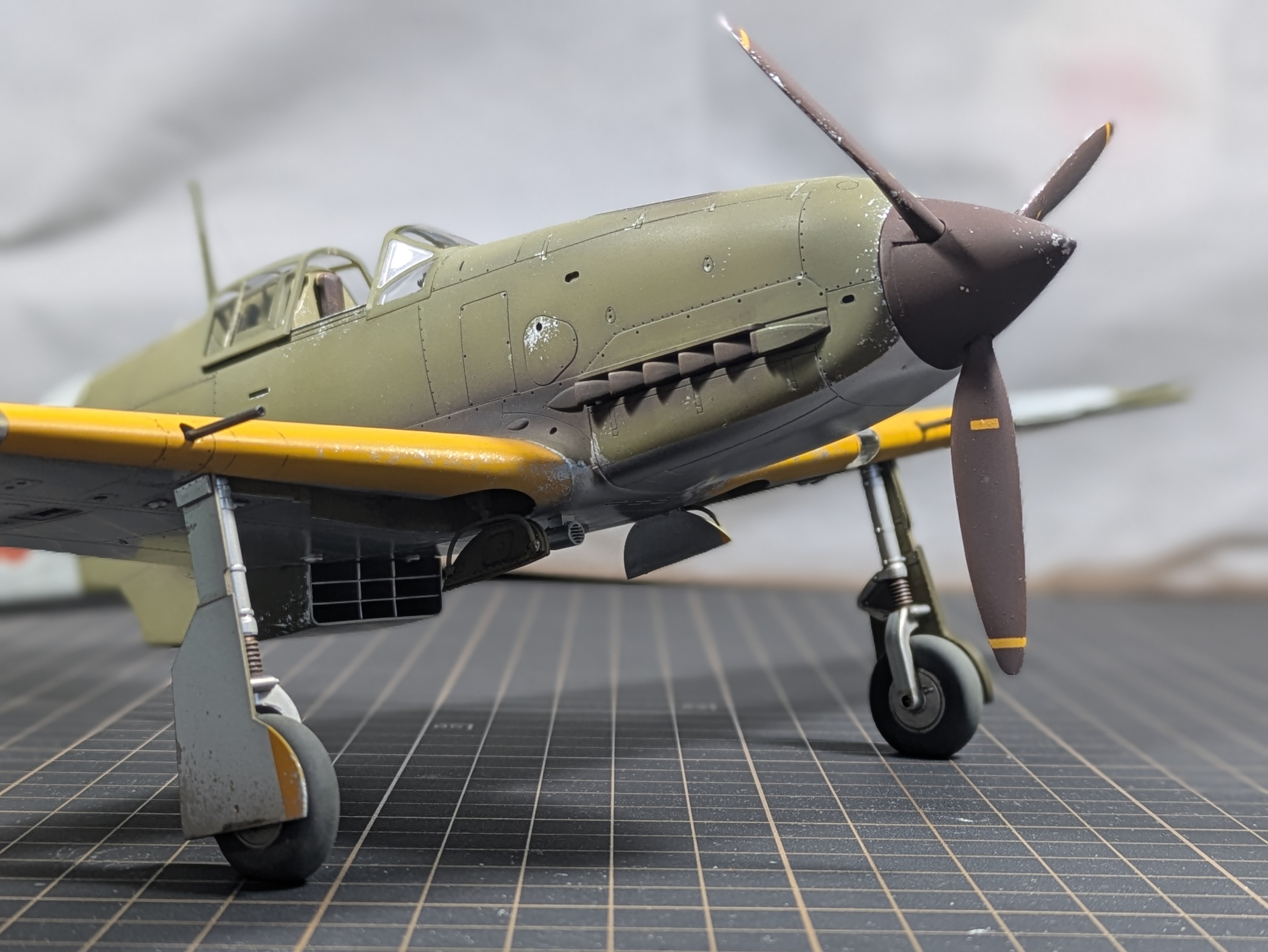 Three-quarter right close-up - prop, leading edge, underside intake, landing gear