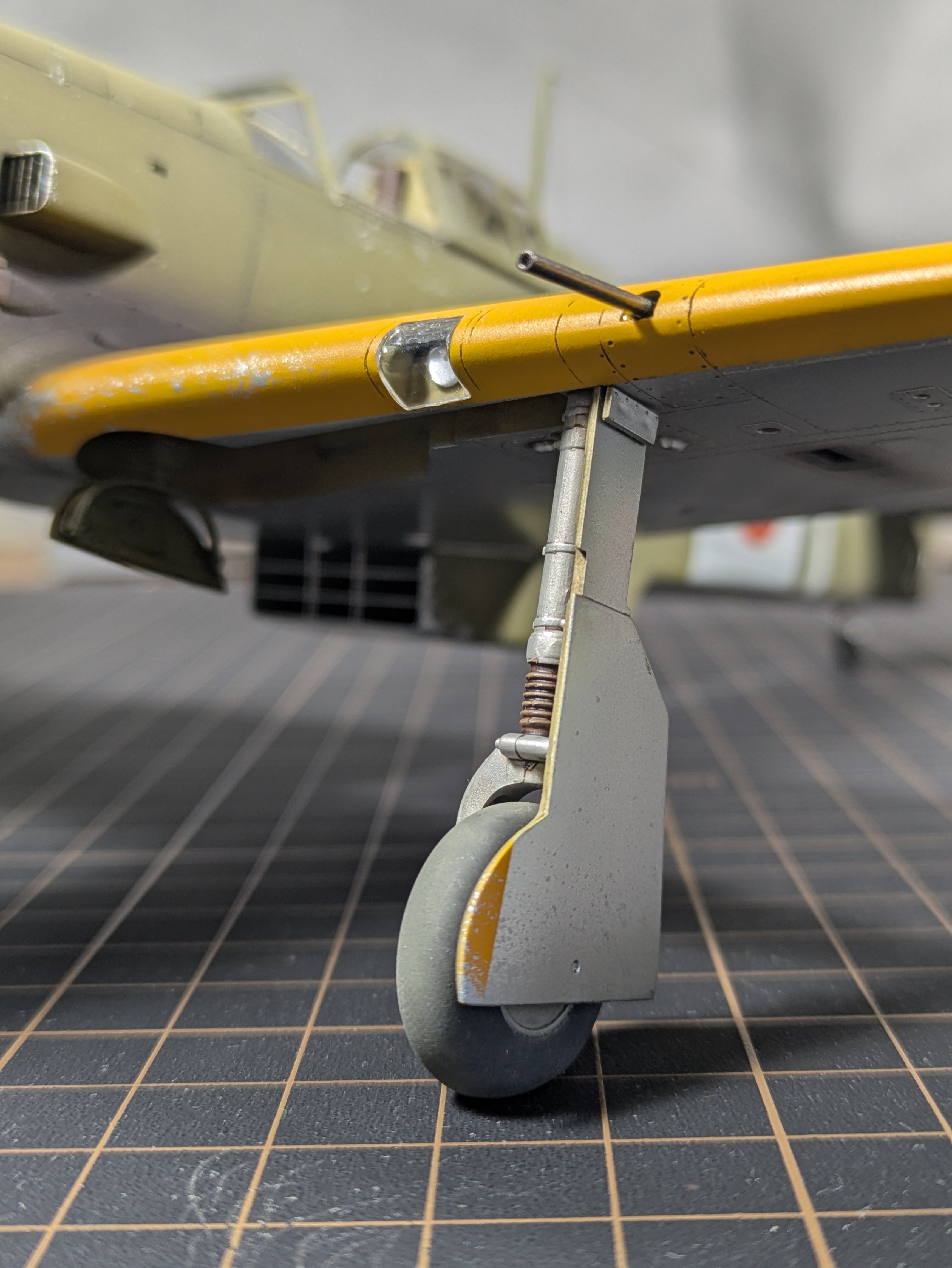 Left landing gear close-up - weathering